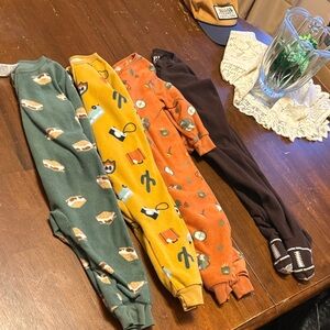 Gerber Kids One Piece Footies in Green, Yellow, Orange, and Brown